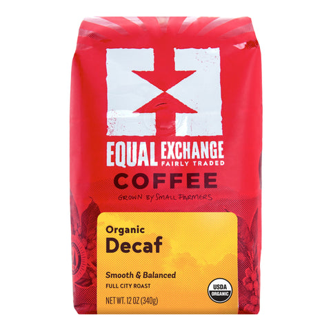 A 12 oz bag of Equal Exchange Organic Decaf Coffee, featuring a bright red bag with a white logo and a yellow label at the bottom.