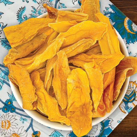 Bowl full of dried mango pieces