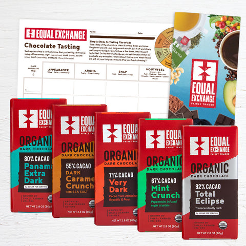 five chocolate bars shown with chocolate tasting form and brochure