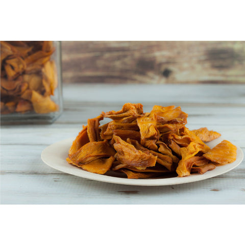 A plate of dried mango strips