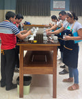 Cupping coffee in the quality lab at Comon Yaj Noptic co-op in Mexico