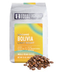 Equal Exchange organic Bolivia light roast coffee package on a white background and whole coffee beans