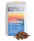Coffee bag labeled 'Equal Exchange Cloudbreak' on a white background with whole coffee beans