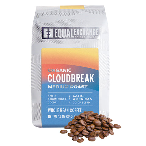 Coffee bag labeled 'Equal Exchange Cloudbreak' on a white background with whole coffee beans