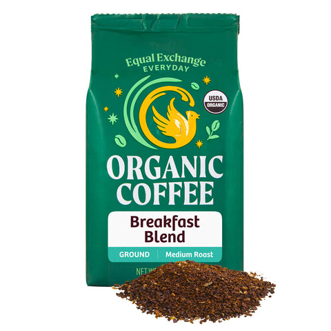 Green bag of Equal Exchange Everyday Organic Coffee Breakfast Blend with a pile of ground coffee