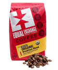 Red bag of Equal Exchange Organic Breakfast Blend coffee with coffee beans on a white background