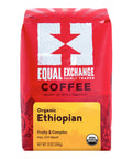 A 12 oz bag of Equal Exchange Coffee Organic Ethiopian, featuring a bright red packaging design with a white logo, black text, and a yellow label at the bottom.