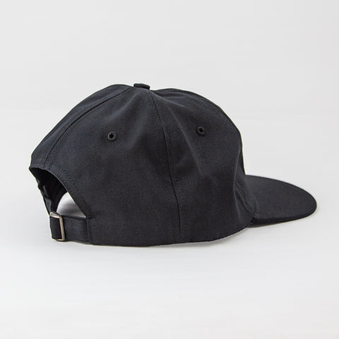 back side view of black organic cotton dad hat with Equal Exchange logo