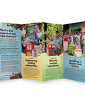 A folded brochure displayed open against a plain white background. The brochure features four panels with text about food choices, farmer communities, coffee, chocolate, and tea, along with photos of people and product packaging.