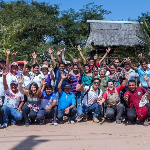 Group of cacao farmers and Equal Exchange staff on a farm visit