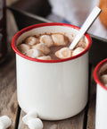 mug of hot cocoa with marshmallows ready to drink